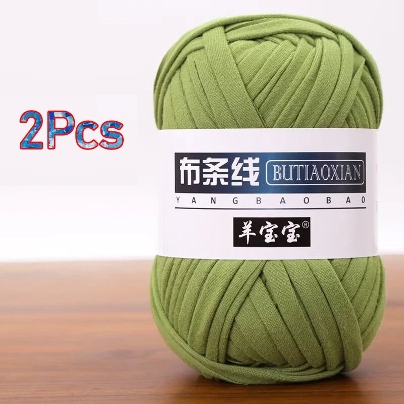 Two skeins of soft chunky green T-shirt yarn for crochet and knitting