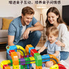 A wooden magic rail cube toy set with colorful building blocks being played with by a father and a child.
