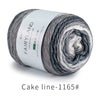A skein of grey and white gradient cotton-wool yarn labeled Fairyland Cake ball for knitting and crochet.
