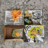 Un set de figurines de combat métalliques Takara Tomy FSGattario C145S hybrides, avec leur emballage et boîte.