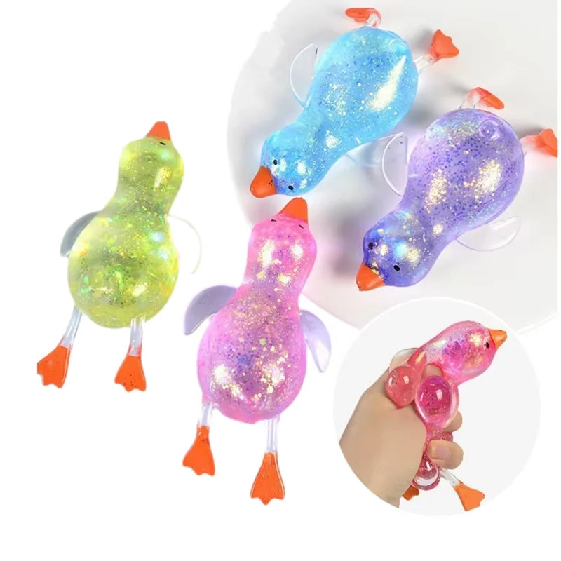 Glitter squeeze stress relief duck toys in blue and purple colors