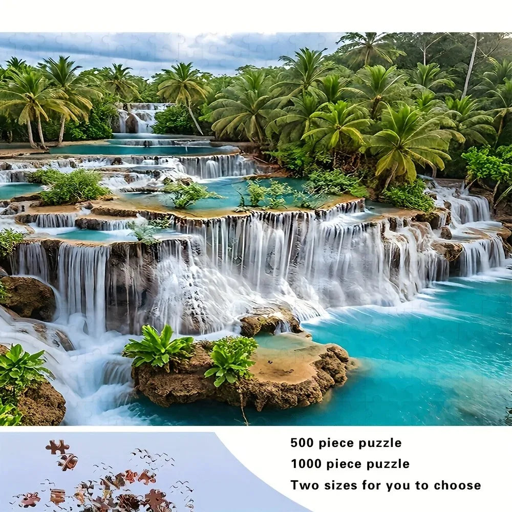 A vibrant tropical waterfall scene featuring lush green foliage and clear blue water, suitable for a 500 or 1000 piece puzzle