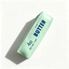 A rectangular light green squeeze bottle of salted butter labeled 4 oz net weight.