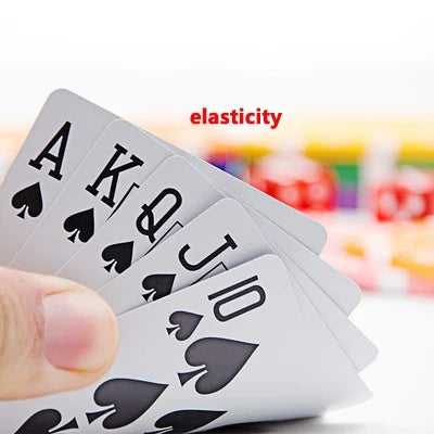 A hand holds a fan of white playing cards showing the Ace, King, Queen, Jack, and Ten of hearts.