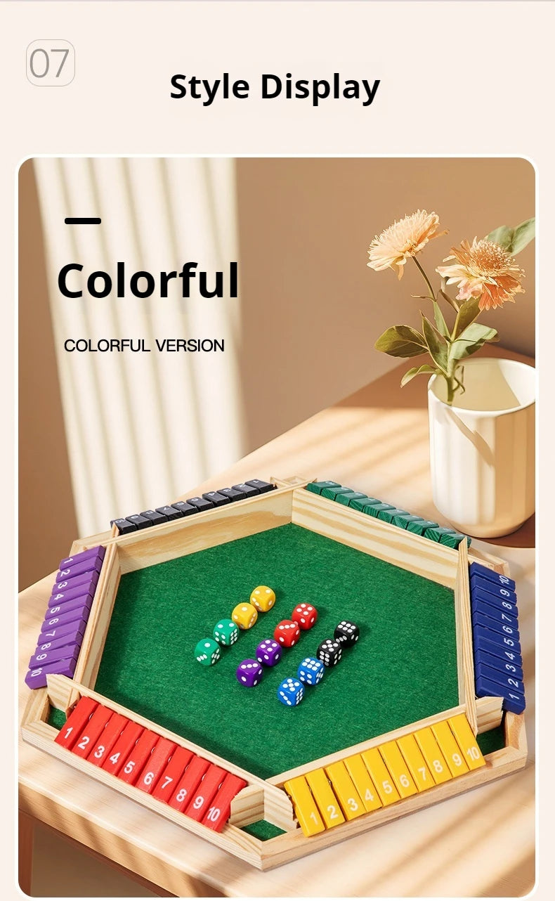 A colorful wooden dice game set displayed on a light wooden surface with natural lighting.