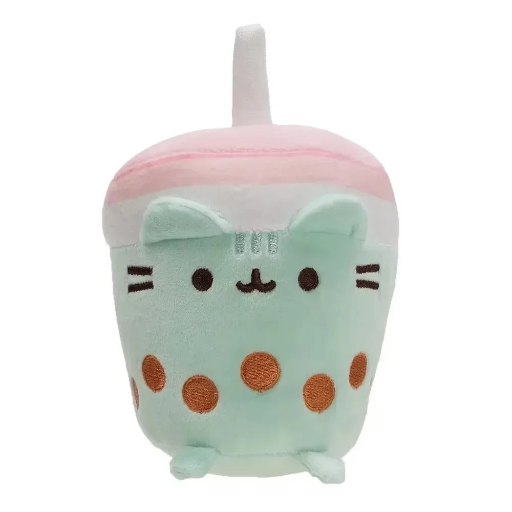 A soft pastel pink and mint green plush cat toy with large eyes and a rounded body.