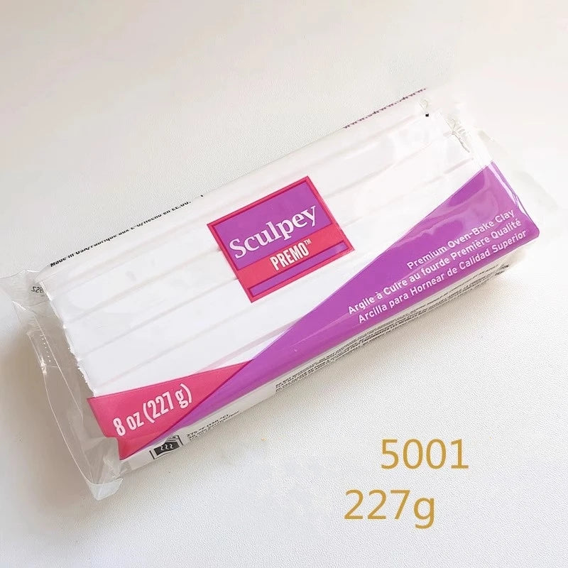 A clear plastic package of Sculpey PREMO polymer clay, 8 oz (227g), for jewelry making.