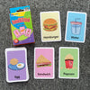 A set of food and drink flash cards for kids featuring images like a hamburger, water, egg, sandwich, and popcorn.