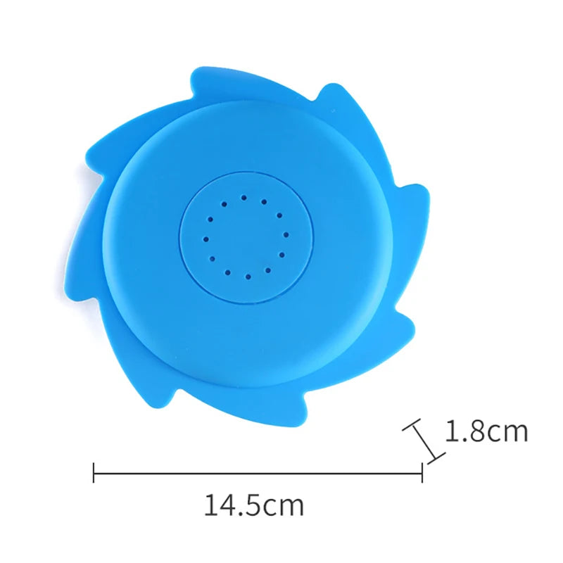A bright blue silicone splash flying ring toy with a central hole for water play.