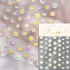 Sheet of 5D bronzing gothic nail art stickers featuring various pastel colored flowers and stars