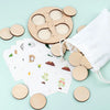 A wooden learning set featuring various circular pieces illustrating the animal and plant life cycle.