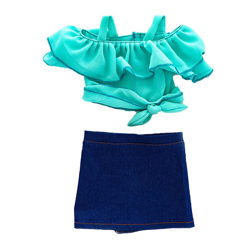 A teal ruffled blouse and matching navy blue skirt set for a doll.