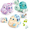 A set of soft rubber push and go friction cars in purple and green colors for babies.