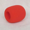 A bright orange foam windscreen pop filter cover for a professional microphone.