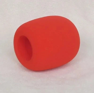 A bright orange foam windscreen pop filter cover for a professional microphone.