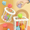 A set of colorful sensory sorting blocks for babies and toddlers, including various shaped blocks in pink, green, purple, and