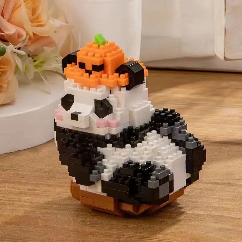A mini panda building block set featuring orange and black pieces, displayed on a wooden surface.
