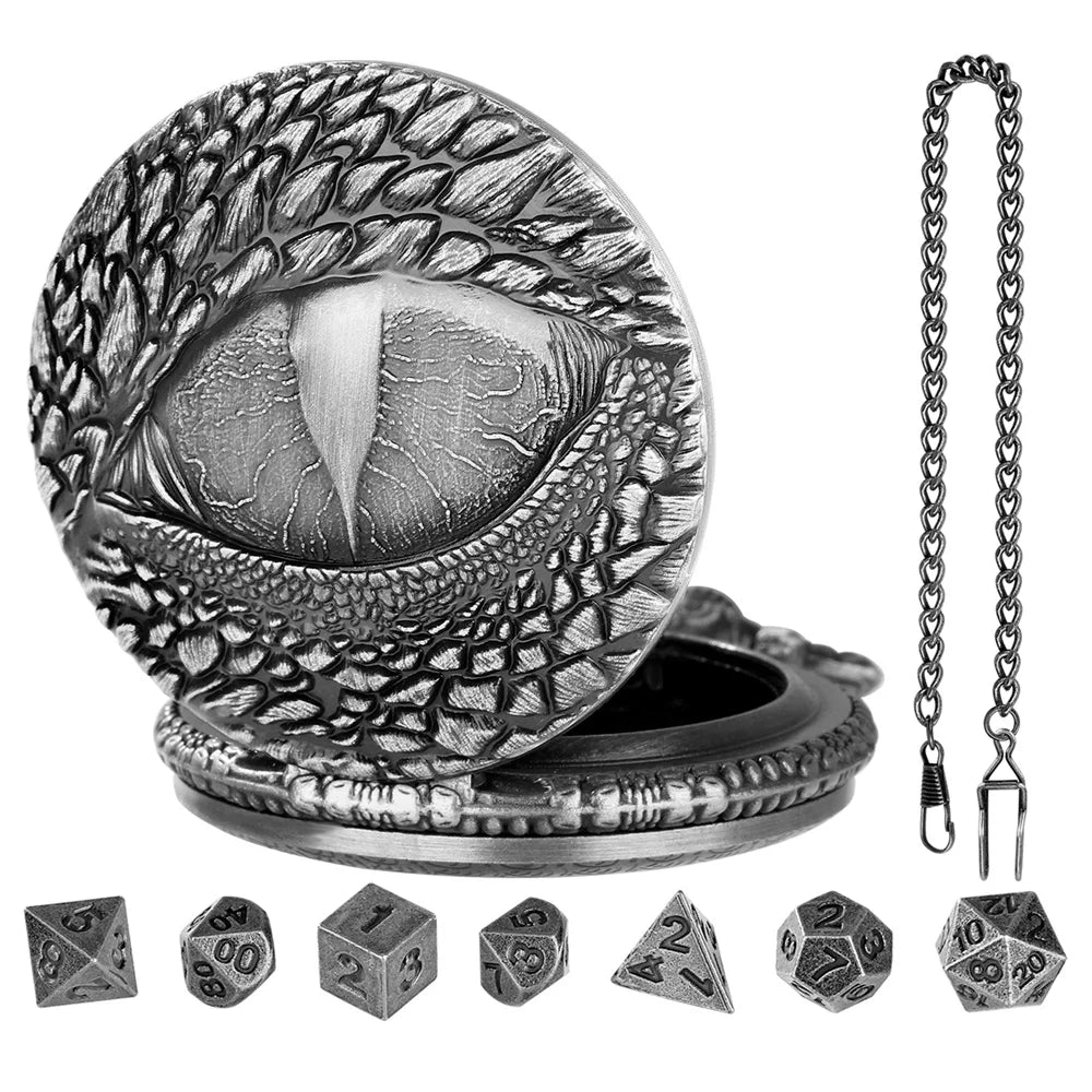 A silver steampunk dragon eye watch case with a lid and seven small dice.