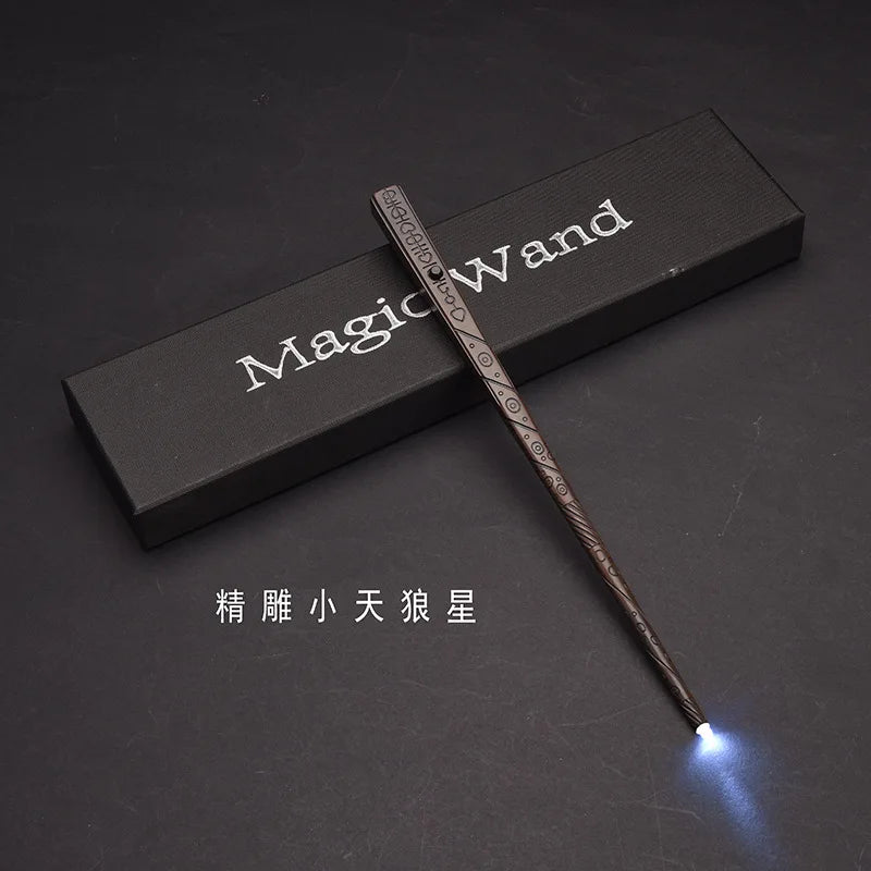 A dark wooden magic wand with an LED light tip rests on a black box, labeled Magic Wand.