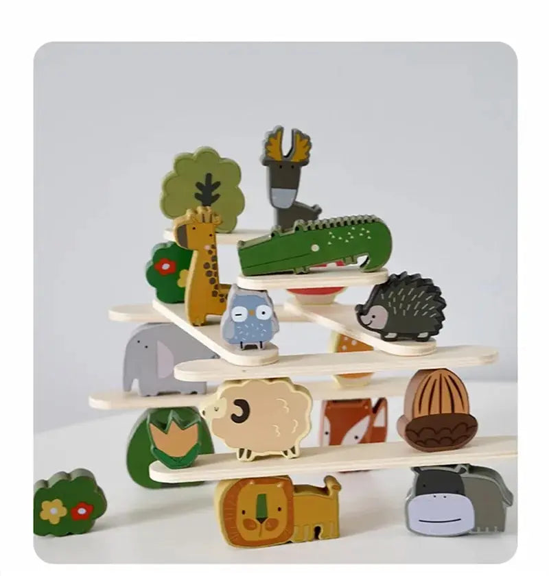 A stack of wooden animal blocks featuring various woodland creatures like a giraffe, hedgehog, and owl.