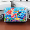 A rectangular jigsaw puzzle featuring a vibrant underwater scene with a mermaid and colorful marine life.