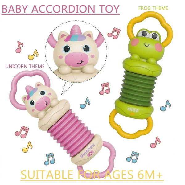A pink and green cartoon frog unicorn accordion toy with a yellow handle, suitable for babies 6 months and older.