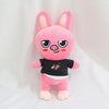 A pink rabbit plush toy with large ears and a black shirt, set of 8 cute cartoon animal plush toys