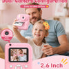 A man and a girl are using a pink instant camera with a dual-camera configuration to take selfies.