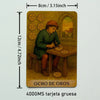 A rectangular tarot card depicting a person in a green tunic working at a wooden table, labeled Ocho de Oro.