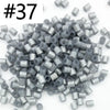 A pile of 1000 assorted 5mm fuse beads in various colors for creative craft projects.