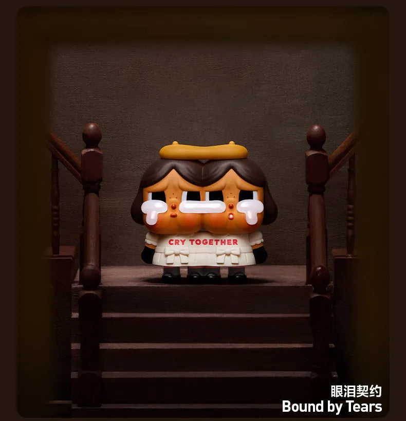 POP MART collectible figure blind box depicting a face with tears and the text CRY TOGETHER