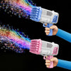 A hand is firing a pink bubble gun that is spraying colorful bubbles against a black background.