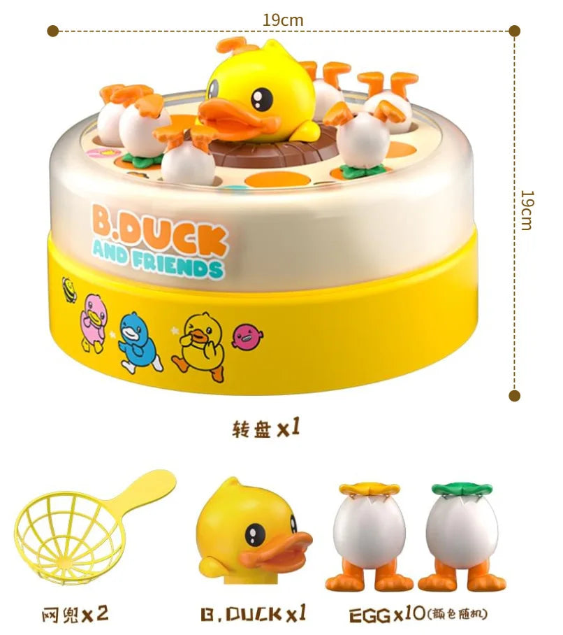 A round yellow and white toy cake featuring a duck character, along with related accessories like a yellow scoop and egg-shap