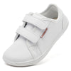 White kids barefoot sneakers with double hook-and-loop straps shown from the side.