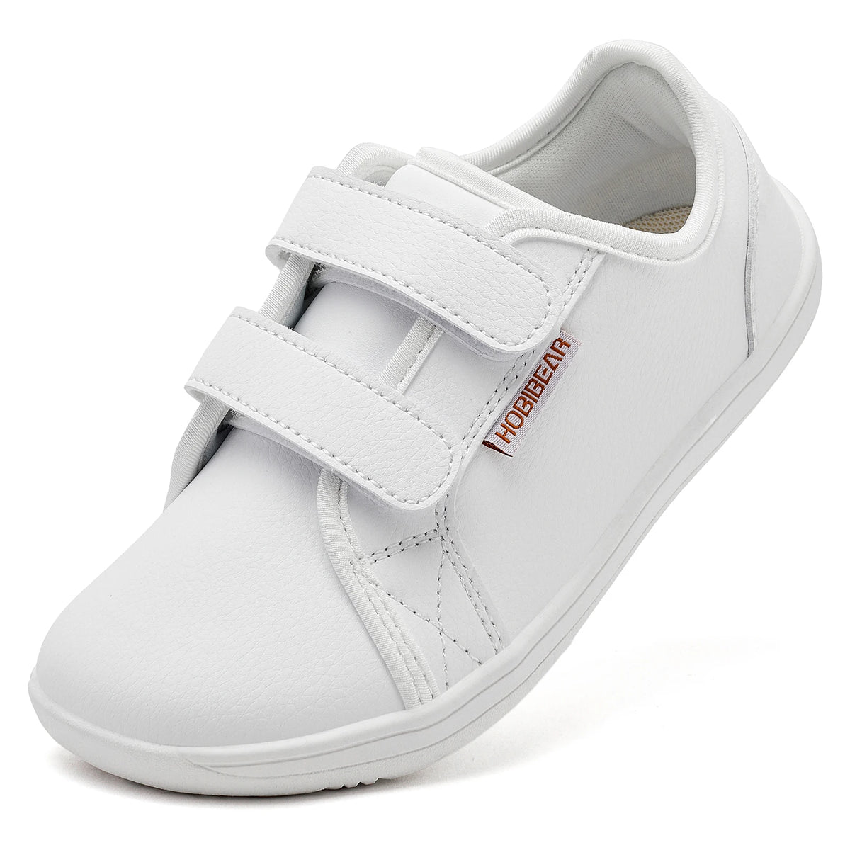 White kids barefoot sneakers with double hook-and-loop straps shown from the side.
