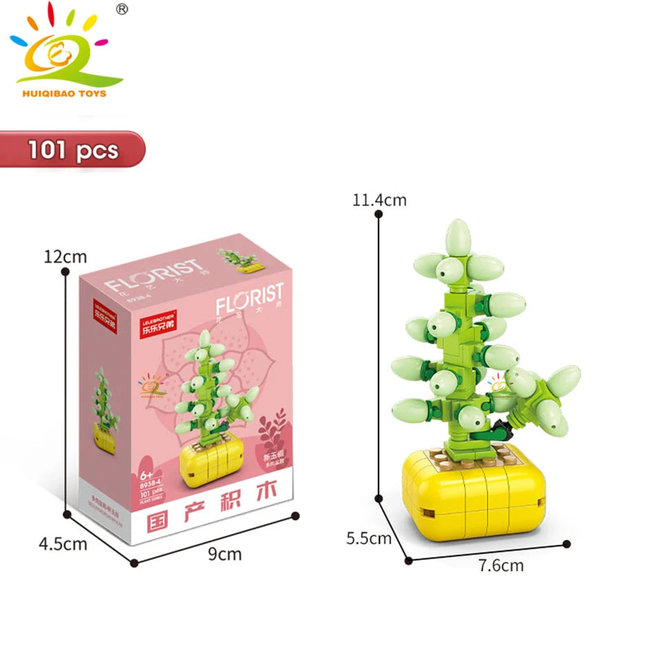 A set of 101 plastic flower succulent building blocks in various shades of green and yellow.