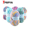 A collection of multicolored soft milk cotton yarn skeins for knitting and crochet