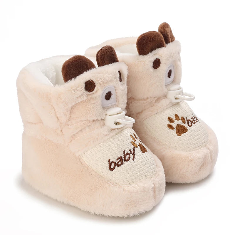 Pair of light beige faux fur baby winter cartoon boots with brown ears and non-slip soles