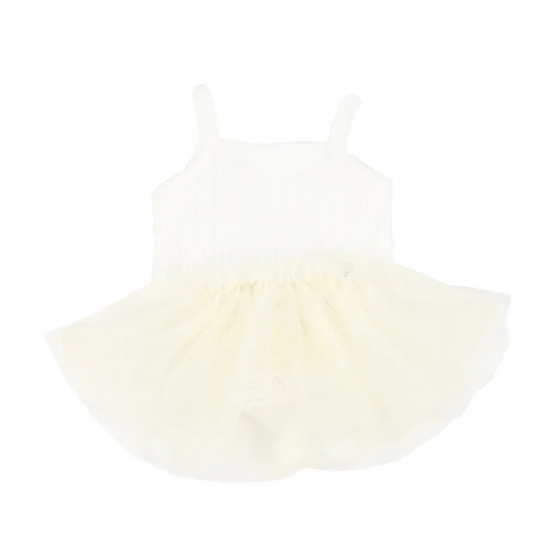 A white three-piece doll outfit set for a baby doll.