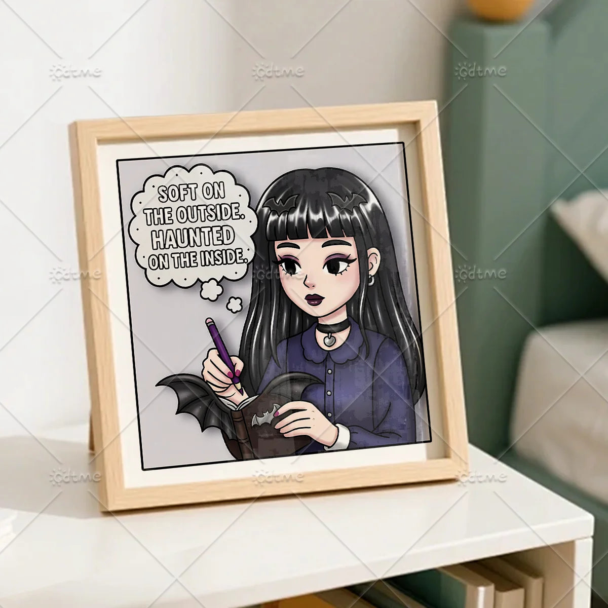 A framed illustration featuring a girl with dark hair and purple clothing, surrounded by spooky text.