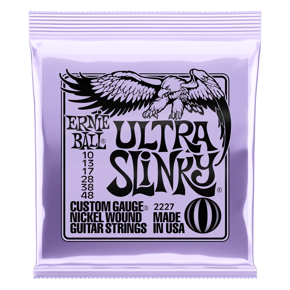 A purple foil packet of Ernie Ball Ultra Slinky nickel wound electric guitar strings featuring an eagle graphic.