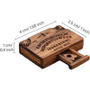 A wooden miniature Ouija board with a drawer showing the alphabet and directional markings.