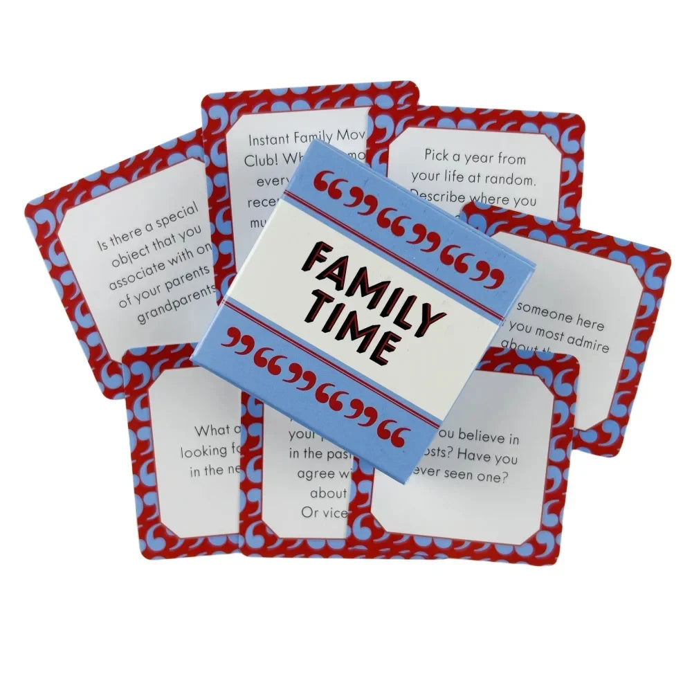 A set of red and blue family conversation starter cards with prompts like Pick a year from your life or Describe where you.