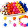 A collection of colorful silicone beads in various shades including yellow, orange, pink, and blue.