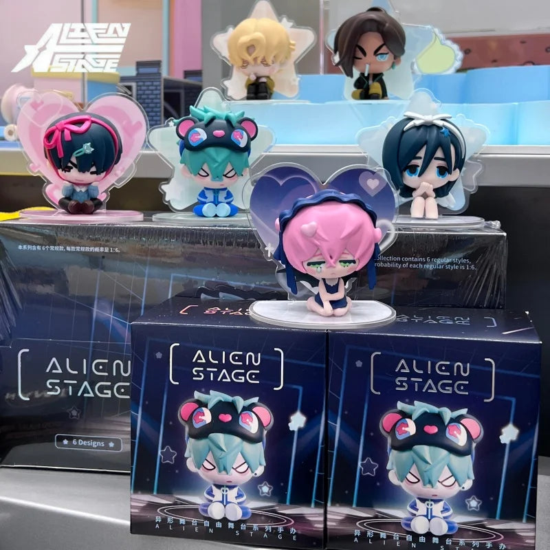 A collection of Alien Stage blind box figures featuring cute, stylized characters in various colors and designs.
