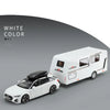 White diecast metal RV camper truck model shown in a side view against a gray background.