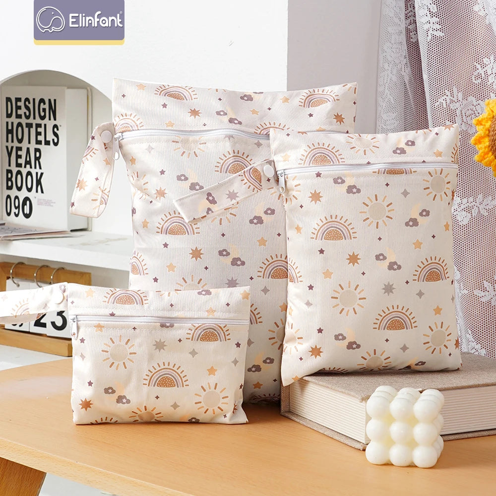 A set of three waterproof wet and dry bags for swimsuits, diapers, and travel, featuring a light beige pattern with suns and 