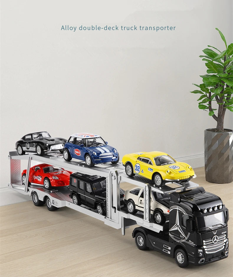 A white alloy double-deck truck transporter carrying several diecast model cars.