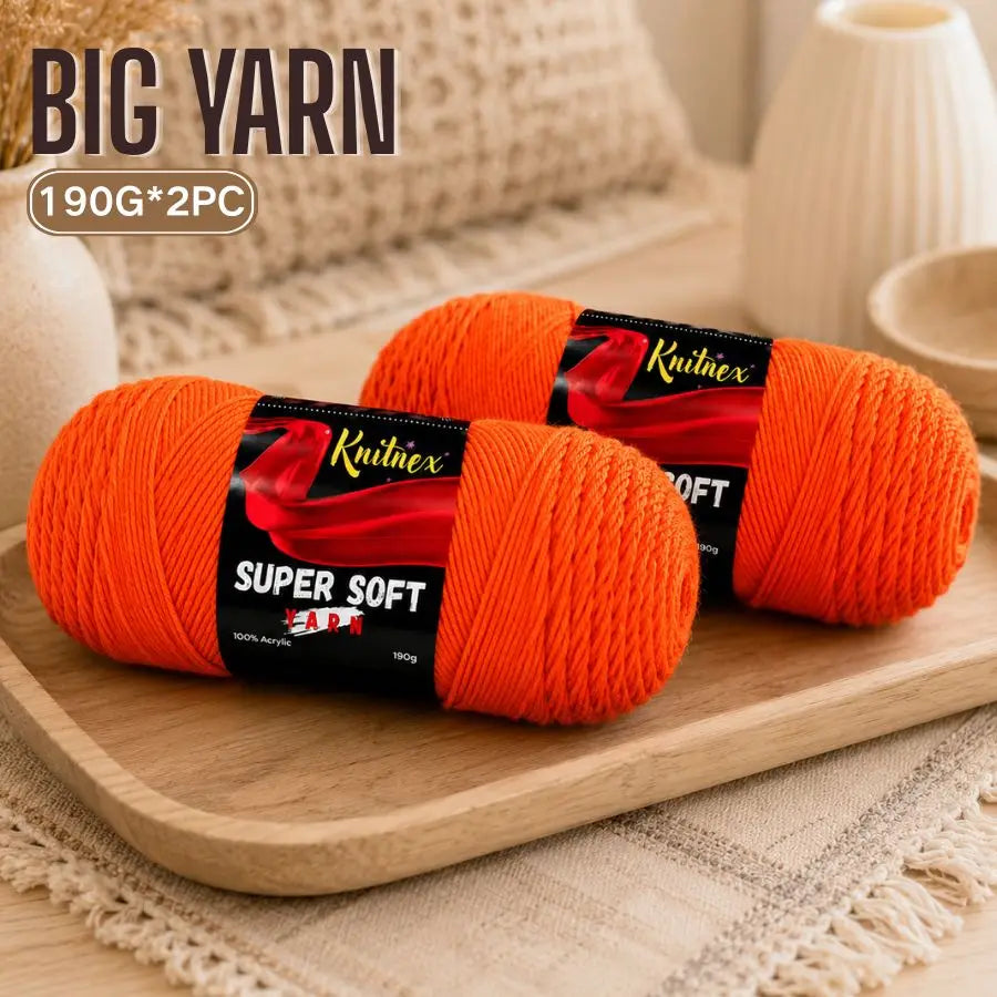 Two orange Knitnex super soft acrylic yarns are displayed on a wooden board.