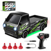 Modèle de voiture de course de dérapage à l'échelle 1:64 noire avec accessoires et emballage.